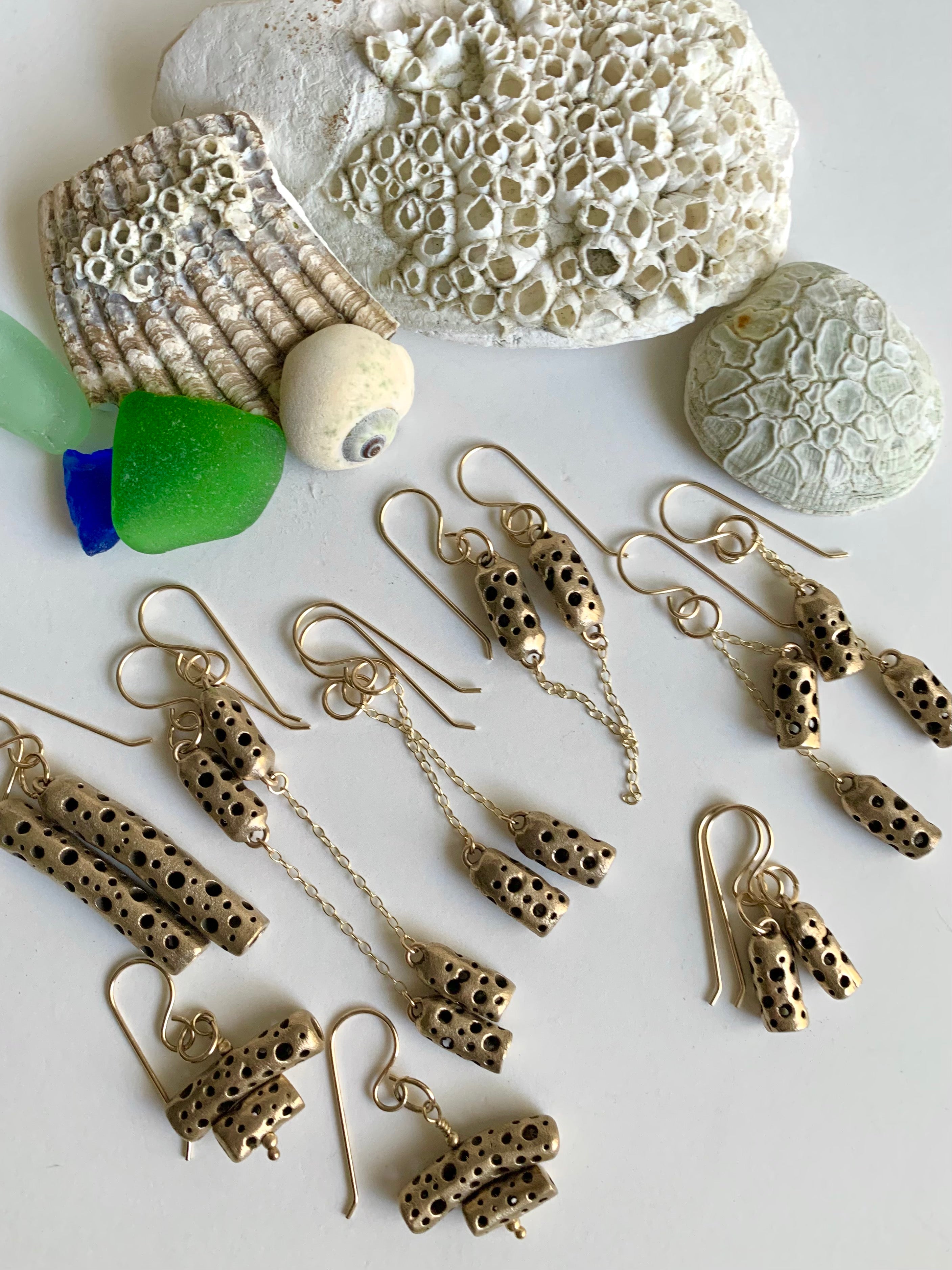 Bronze artisan made earrings with shells