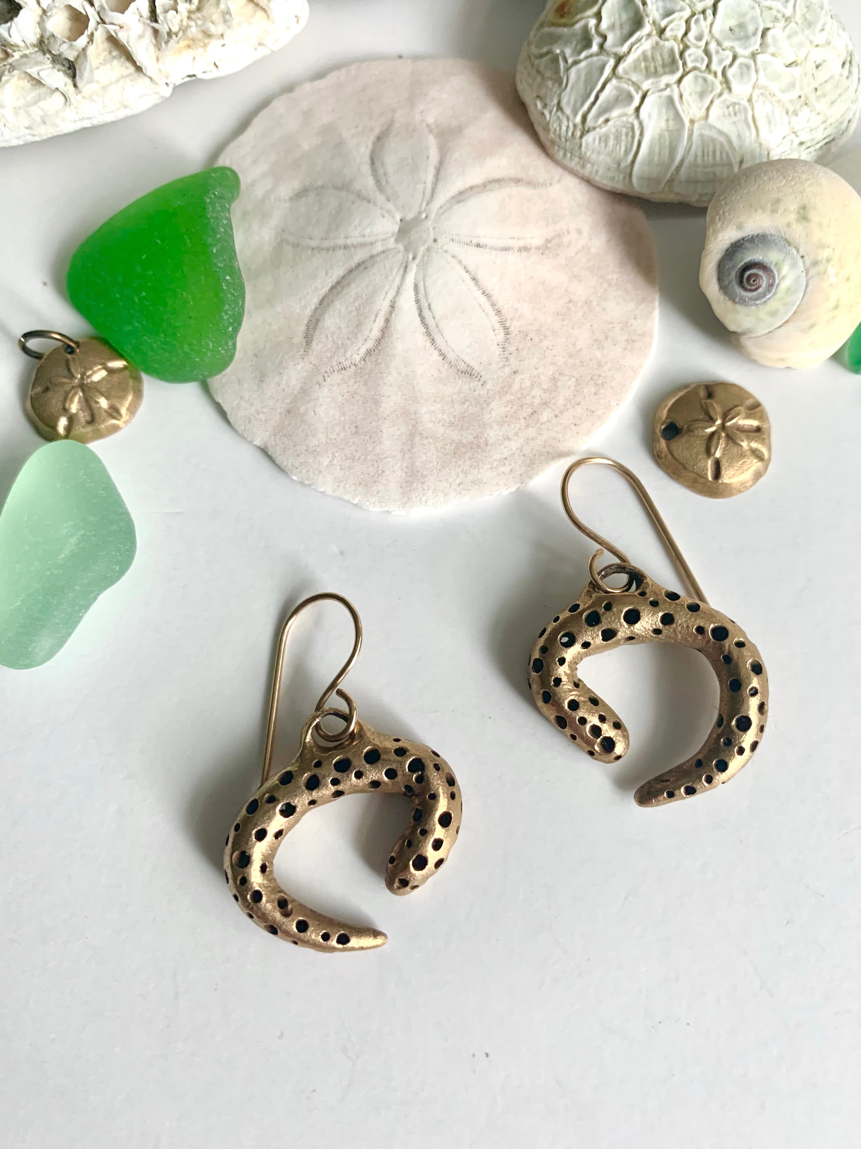 Bronze hand made curl earrings with seashells and glass