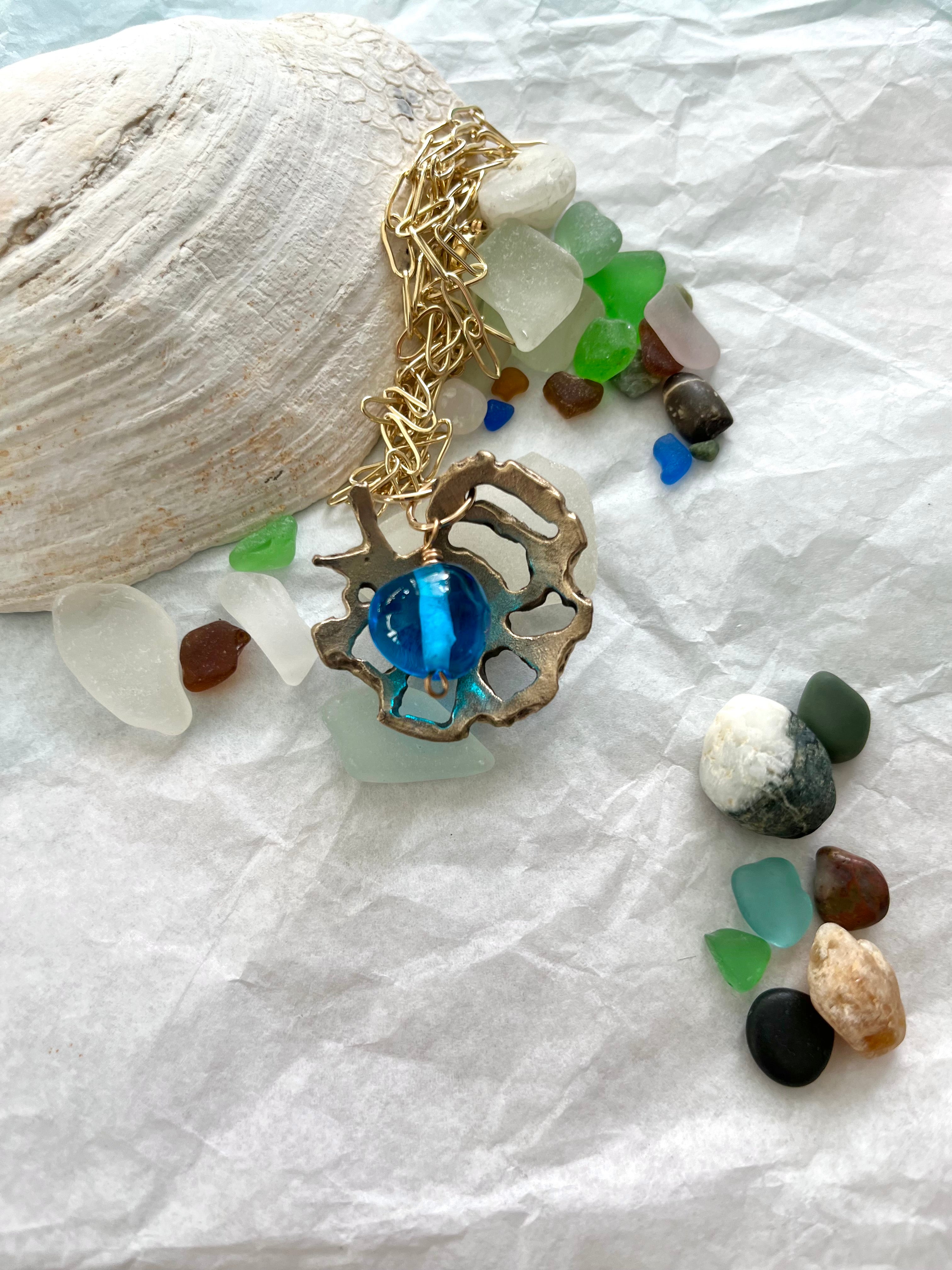 Sea glass with shell and handmade bronze necklace