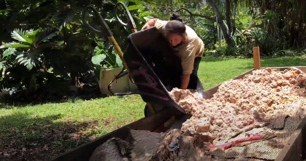 Chantal layering the compost bins