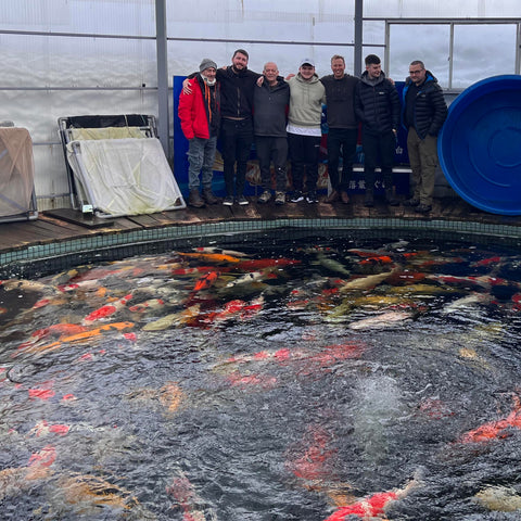 Koi hobbyist group photo at Maruhiro Koi Farm