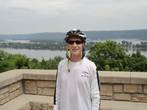 One tired rider with Mississippi River in background.