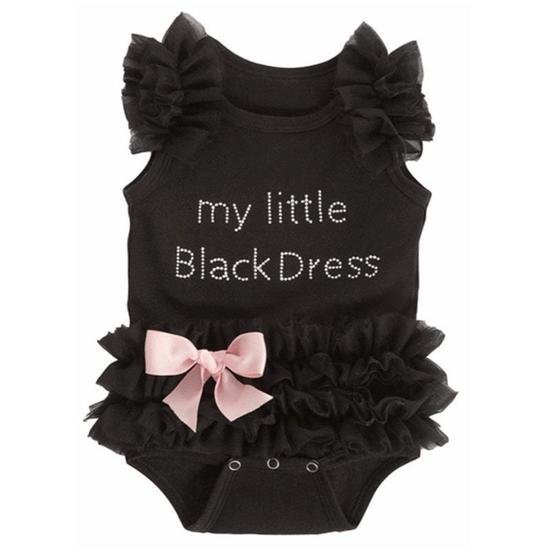 baby girl in black dress