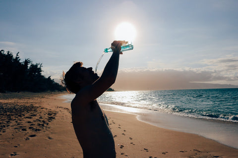 man drinking water