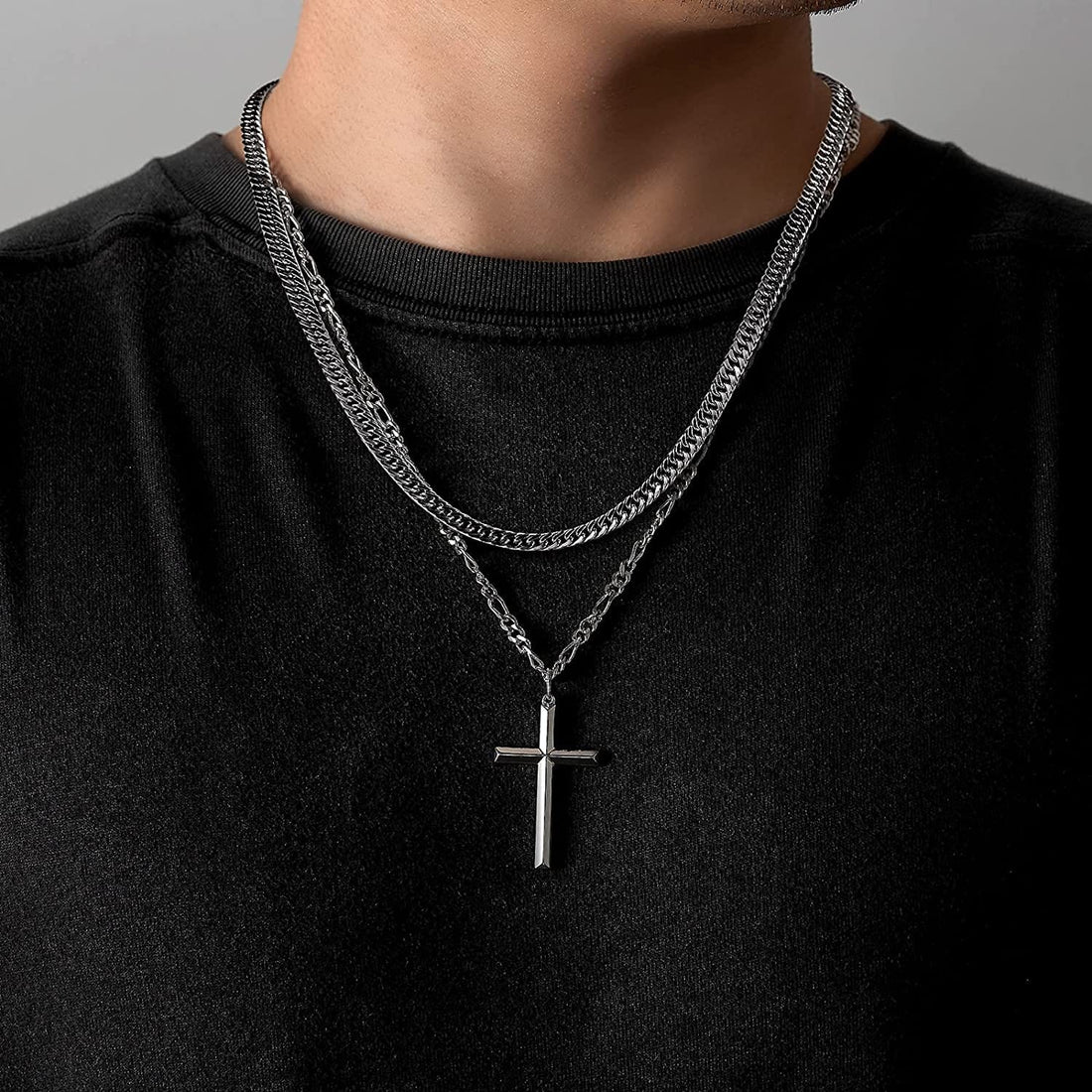 silver figaro chain with cross