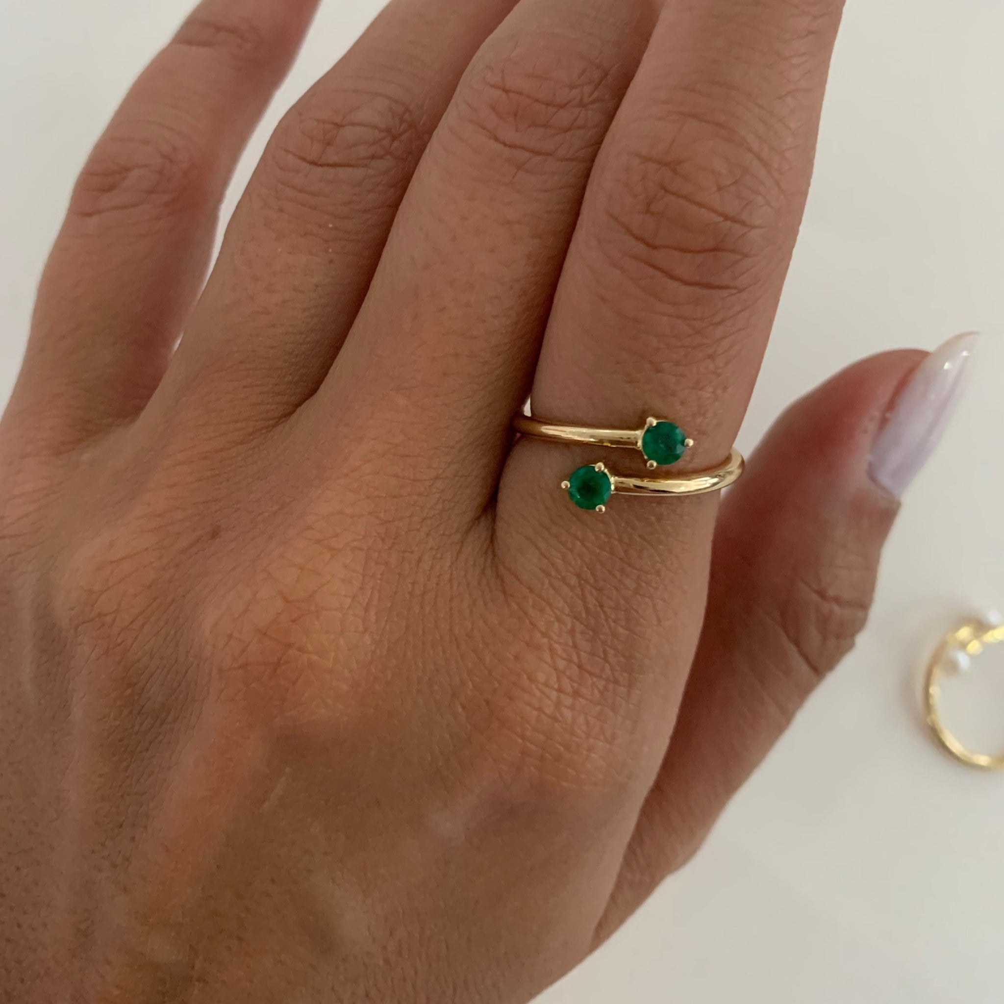 Emerald Twist Ring