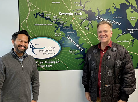Andrew Muñoz, pharmacy manager at Park Pharmacy, and artist Joe Barsin displayed a digital map of Severna Park and nearby neighborhoods.