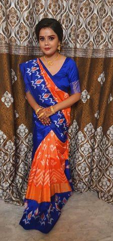 Ridipta from Agarpara, West Bengal looking absolutely fabulous in her Pure Handloom Double Ikkat Pochampally Silk Saree in Orange and Blue from Bengal Looms India.