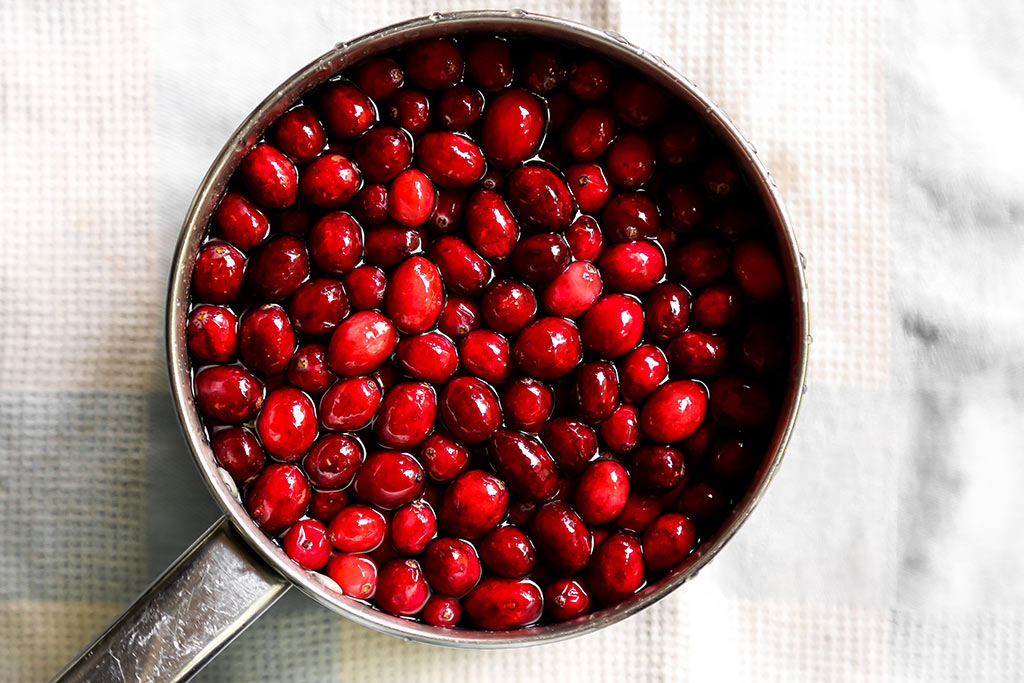 Pot of cranberries for sparkling matcha green tea recipe