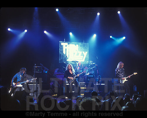 Photo of Thin Lizzy performing in concert in 2004 - thinlizzy0440