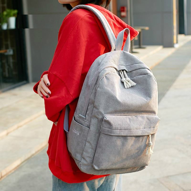 grey corduroy backpack