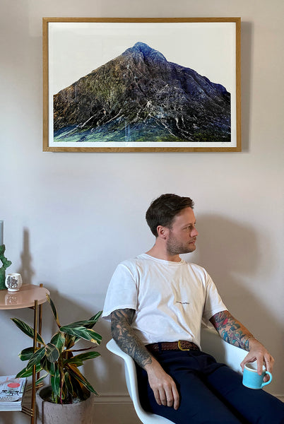 Lee sitting at home wearing his Braided Walnut Brown Awling belt.