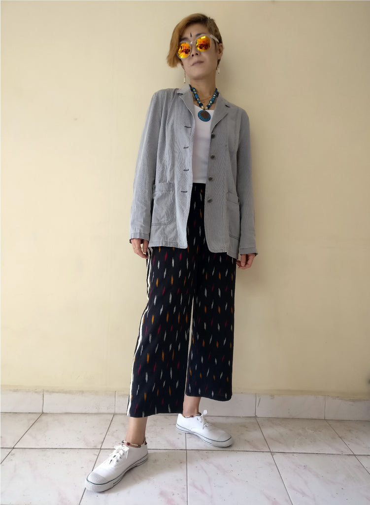 5th image for a blog "7 Ways How to Style Track Pants - Let's Create India's Answer", Ikat track pants with an oversized plain grey blazer
