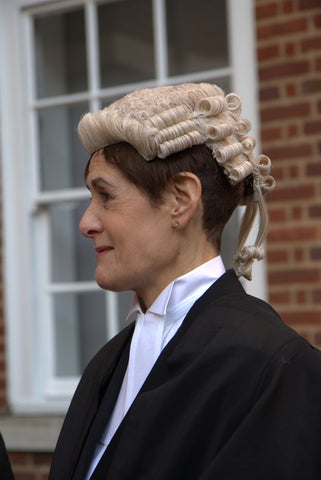 Female barrister in wig and gown