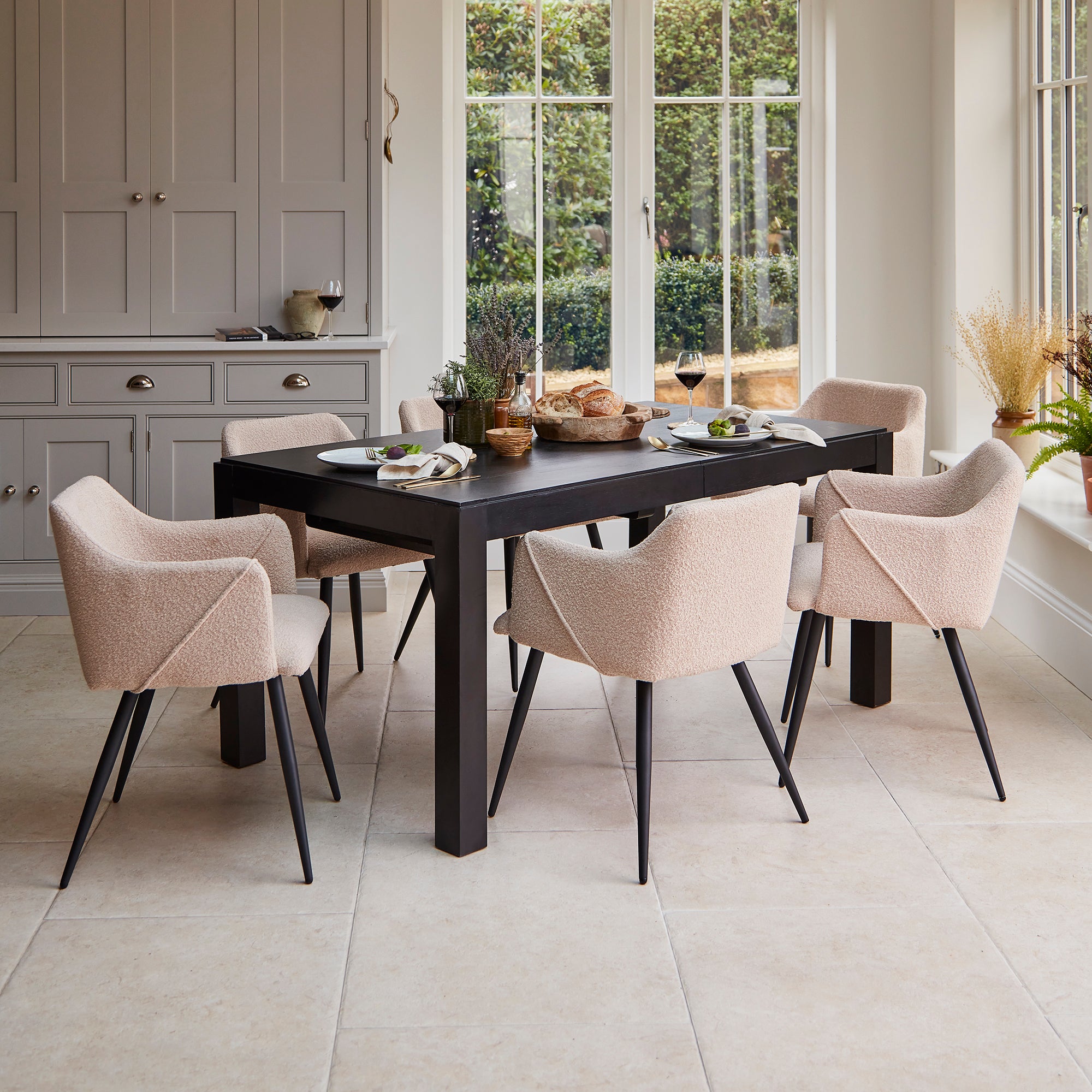 Magnus dining table and Boucle amy dining chairs Laura James