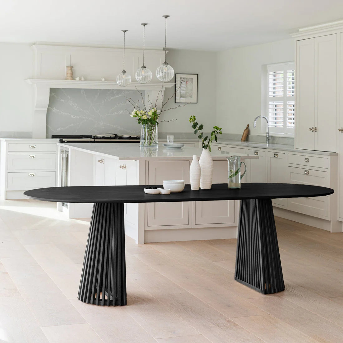 Willow Stained Black Oval Dining Table - Laura James