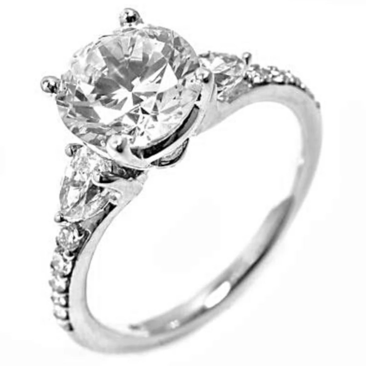 Platinum Round Diamond Engagement Ring with Pear Shape Diamond Sides