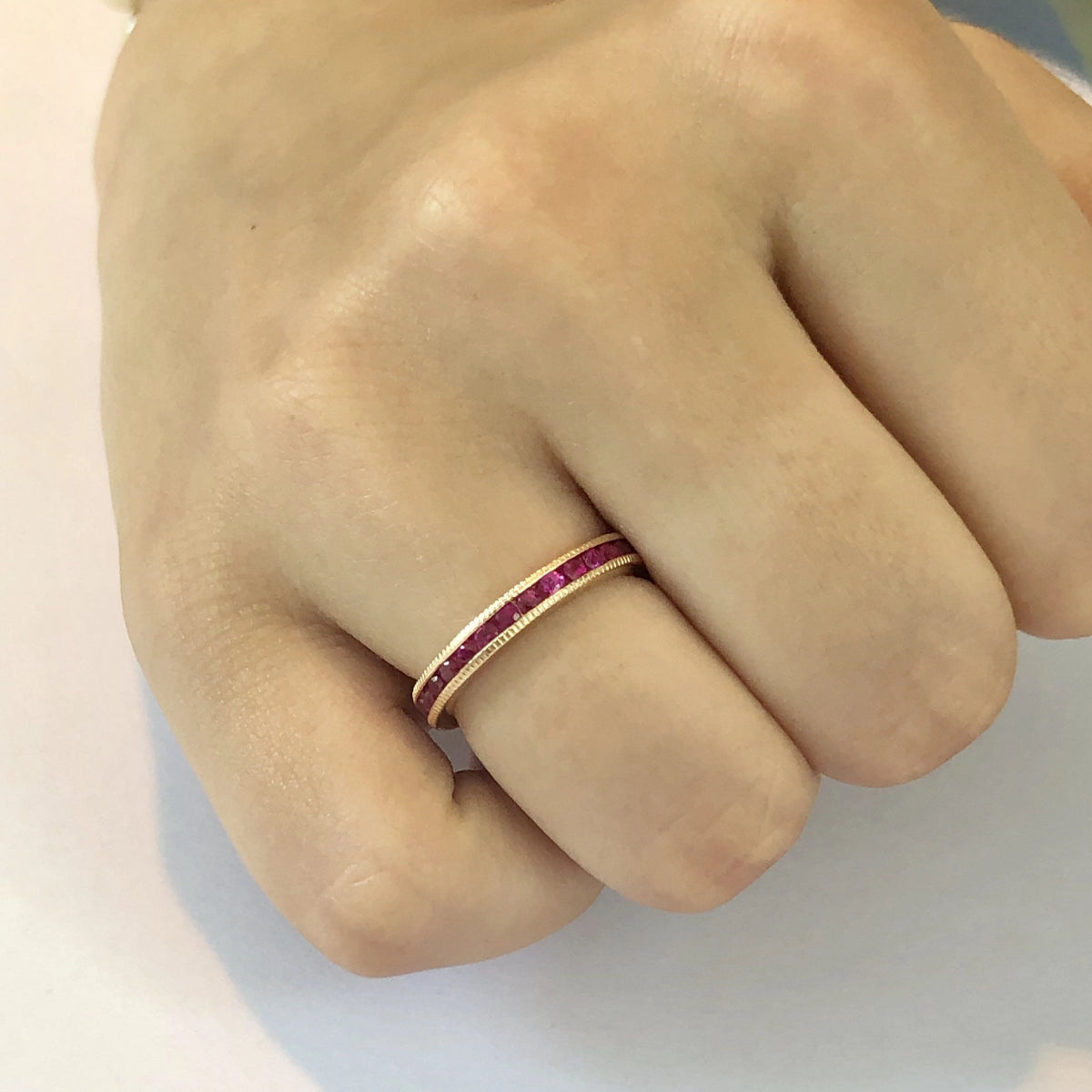 18 Karat Rose Gold Ruby Eternity Band Milgrain Edge