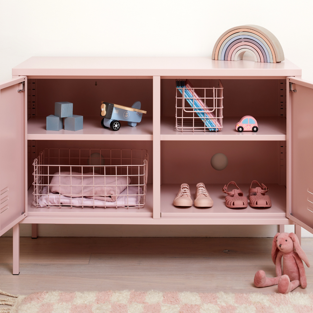 The Lowdown in Blush open with Blush Baskets and toys inside. 