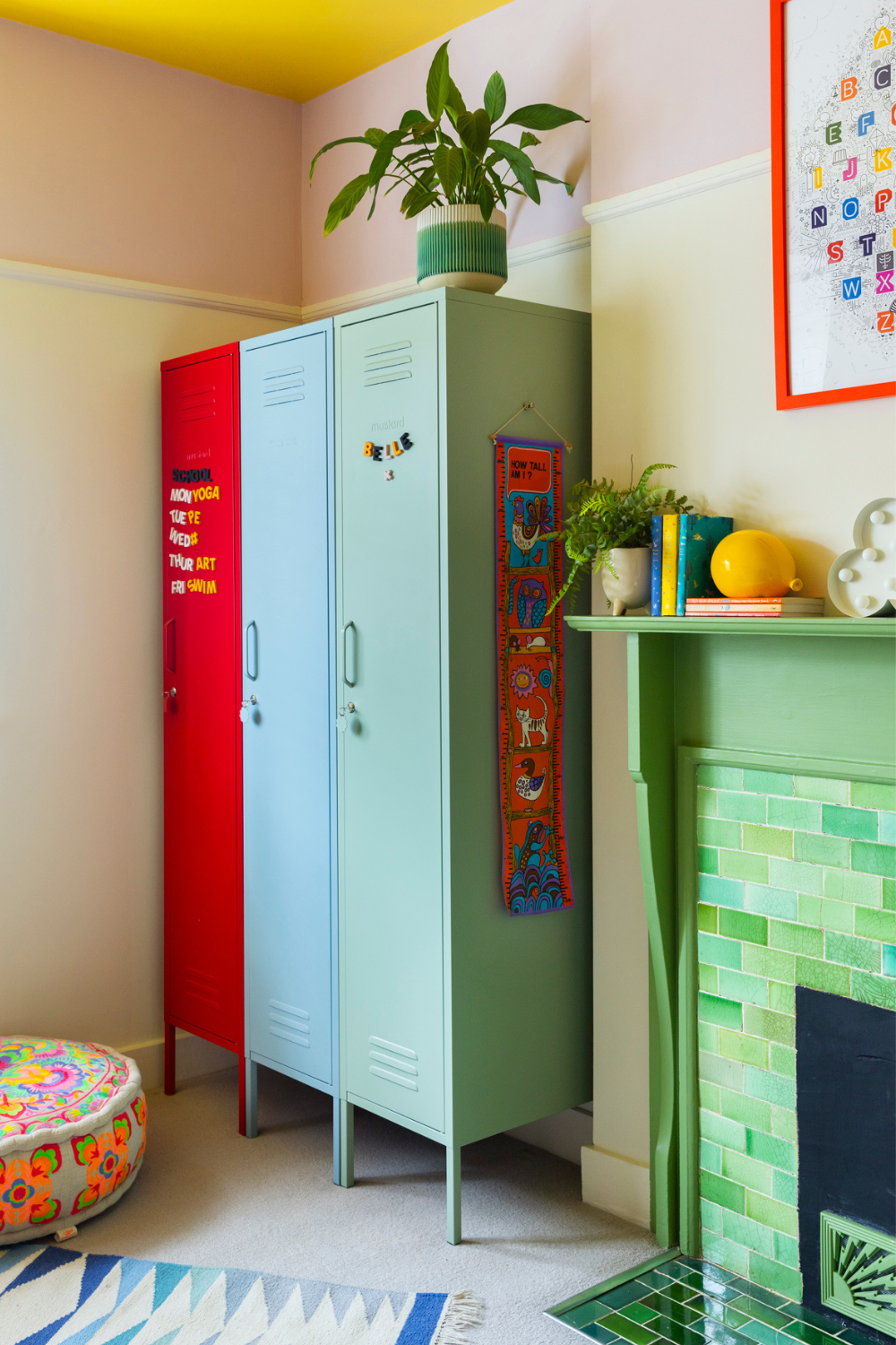 Three Skinny lockers in Poppy, Ocean and Sage are decorated with wordbits magnets spelling out 'Belle' and an activity schedule.