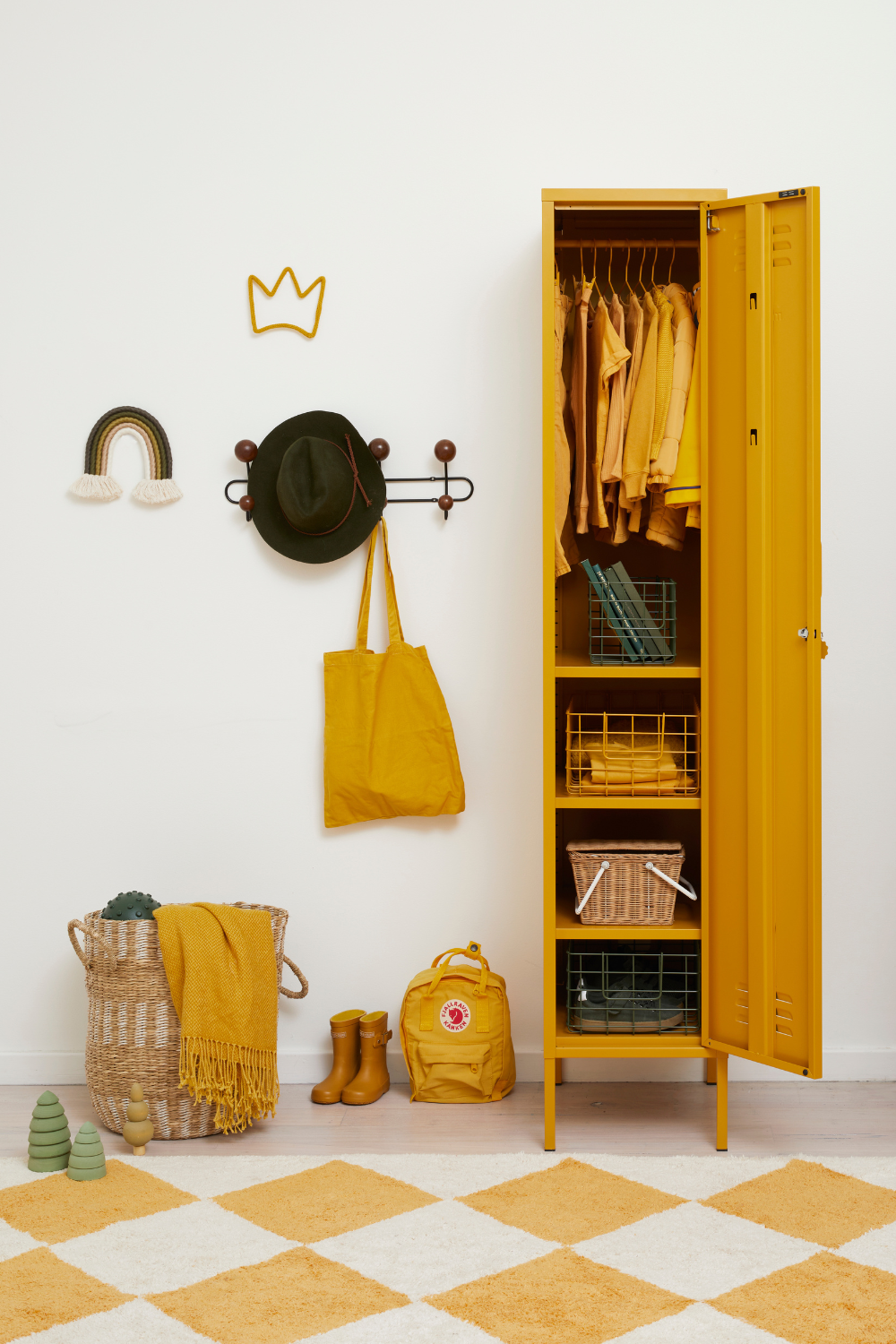 A Mustard Skinny is styled with a range of Olive and Mustard accessories including baskets, clothes and boots.