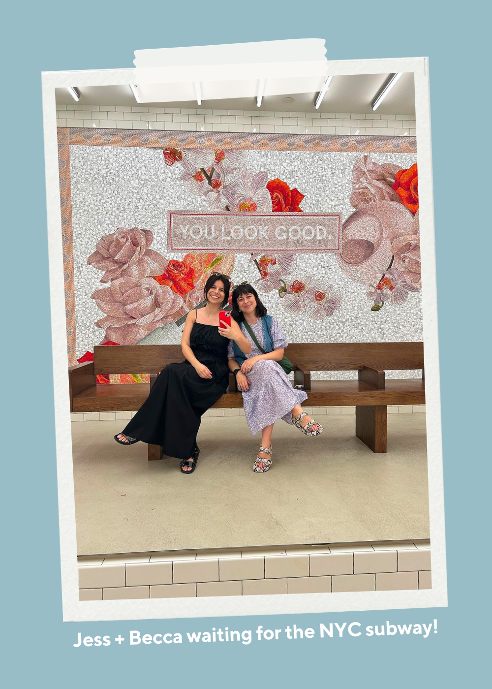 A polaroid of Becca + Jess on the NY subway. There is a sign behind them that says 'you look good.'