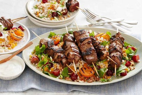 Moroccan-spiced lamb with barbecued apricot-couscous salad