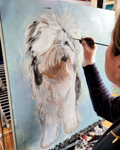 Dawn Crothers painting Arlo who visited her studio in Belfast