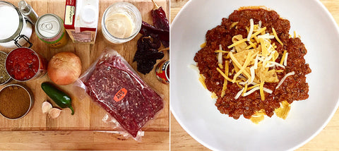 Table array of ingredients for Texas Red Chili, next to a bowl of the finished chili with cheese and corn chips on top