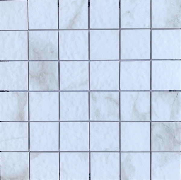 Carrara 2X2 Anti slip Porcelain is composed of Porcelain Chips. This Tile comes to mesh mounted for easy installation- Tiles and Deco