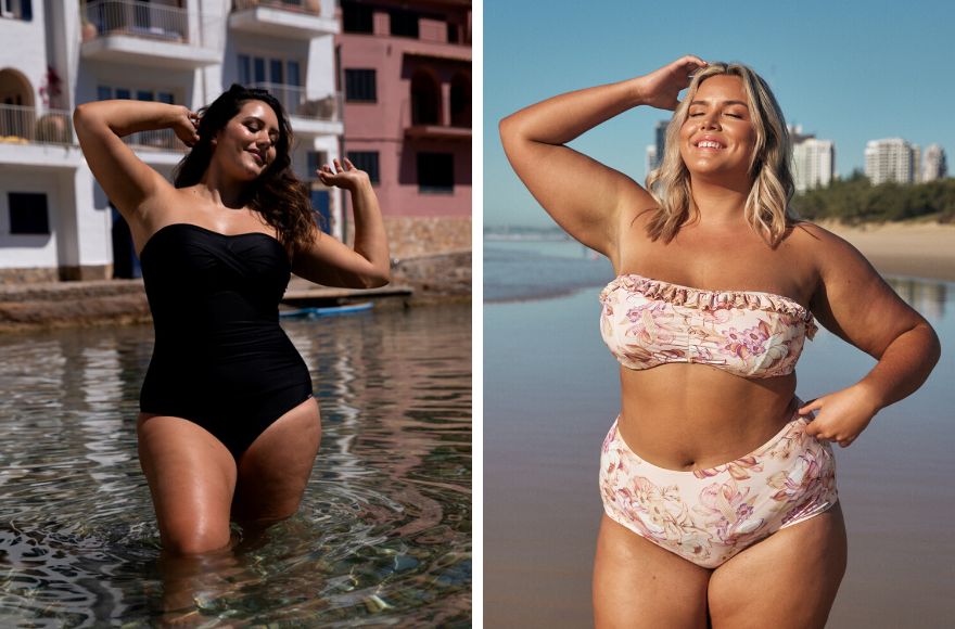 Woman with brown hair poses in the water wearing black strapless one piece swimsuit. Woman with blonde hair poses at the beach wearing a pink floral strapless bikini top and high waist pants