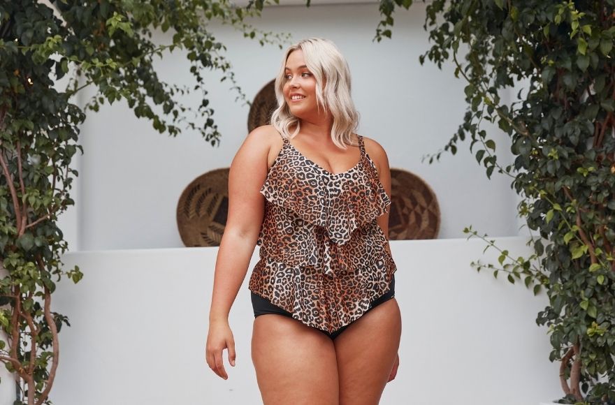 blonde woman wears Leopard print 3 tier tankini top and black high waisted pant