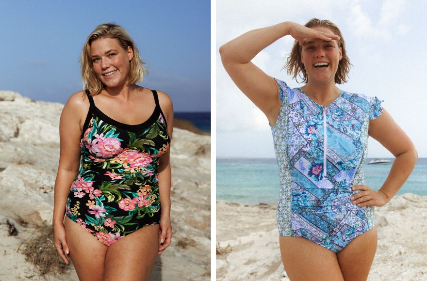 Woman with short blonde hair wears underwire one piece swimsuit in Bora Bora black floral print. Woman with blonde hair wears blue Whitehaven frill sleeve one piece swimsuit. 