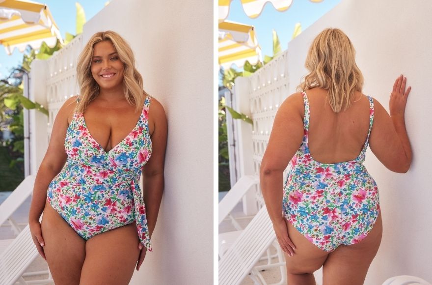 Woman wears white and floral deep plunge v neck one piece.