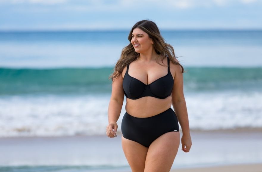 Woman wearing plus size black bikini