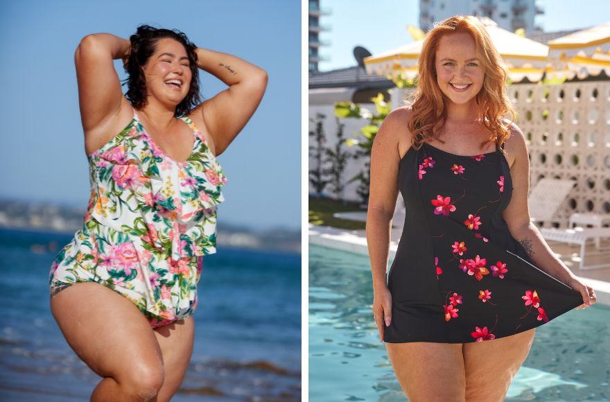 Woman with short brown hair wears white ruffled one piece with a floral print. Woman with long red hair wears black swim dress with bright pink flower design.