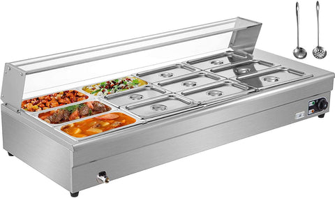 ADVANCED QUALITY- This Bain Marie steam table is made of heavy-duty food-grade stainless steel that is durable, long-lasting, and simple to clean. The stainless steel sheet has a thickness of 0.03 inch (0.7 mm). TEMPTED GLASS SHIELD DESIGN- A removable tempered glass shield with an extraordinary thickness of 0.3-inch is used (8 mm). Guests may easily pick delicacies without worrying about cleanliness thanks to this glass barrier. LARGE CAPACITY- Our Bain Marie warmer comes with 12 large-capacity meal pans, as well as 12 sections and lids. Each pan measures 12.8"x6.9"x5.9" (325x176x150 mm). Each meal pan has a 50% larger capacity due to the 6-inch depth. QUICK HEATING- Featuring a thermometer for direct viewing of the real-time temperature and two indicators to demonstrate functioning status, our Bain Marie food warmer offers a rotary button for precise temperature adjustment, 86-185°F (30-85°C) adjustable. For excellent heat transfer, it uses a 304 stainless steel U-shaped heating tube with three-dimensional heating. (NOTE: Do not let the heating tubing dry out.) Water should be used to immerse the heating tube.) WIDE APPLICATION- Our commercial Bain Marie is appealing, and it's ideal for preserving delectable dishes at a ready-to-eat temperature for visitors. Frequently utilized in professional settings, such as buffets and catering, as well as at home for large gatherings.
