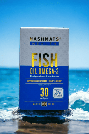 Hashmats Health Fish Oil Omega 3 Halal Gelatin with the blue sea in the background