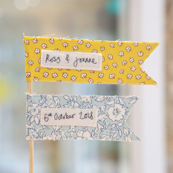 Custom yellow and blue cake topper by Jane Kent