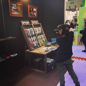 Photographer in front of Wolfgang booth in Japan.