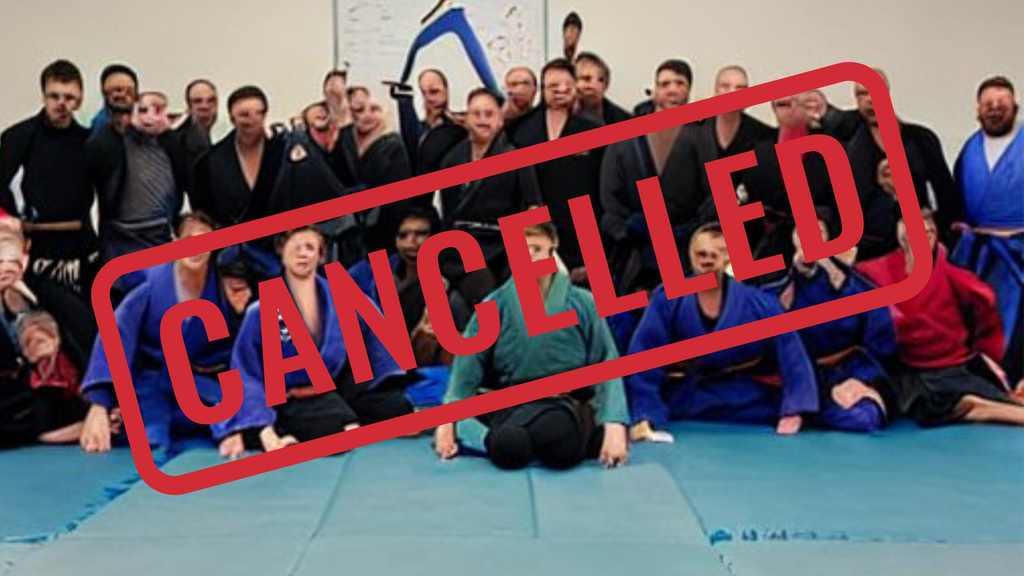 BJJ seminar with a cancelled sign