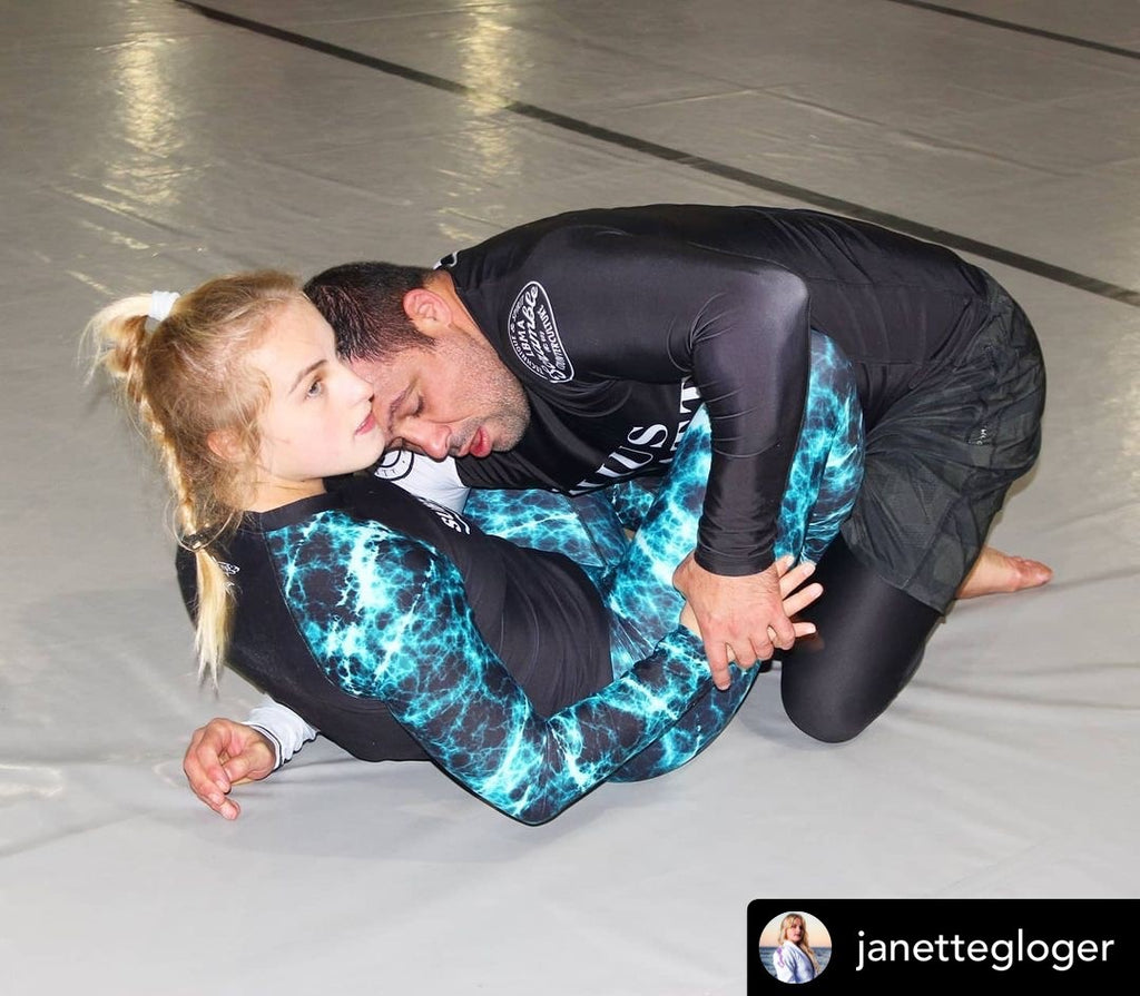 BJJ Training in Submission Shark Rash Guard