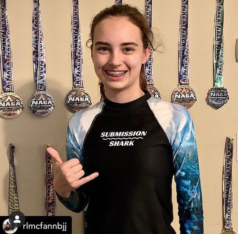 Jiu Jitsu Girl in a Submission Shark BJJ Rash Guard