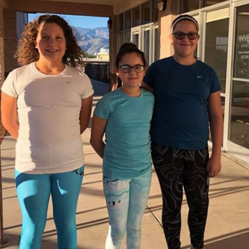 Three BJJ girls wearing Jiu Jitsu spats
