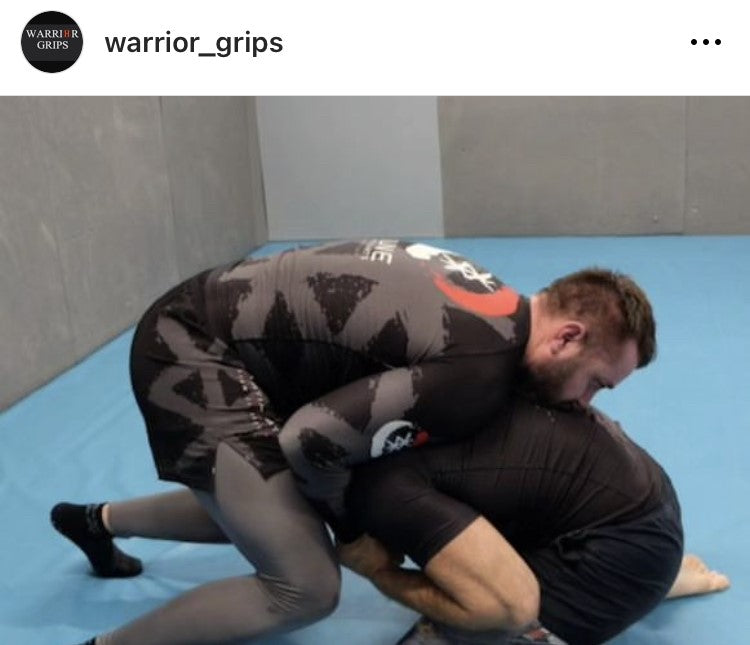 Training In BJJ socks (Warrior Grips)