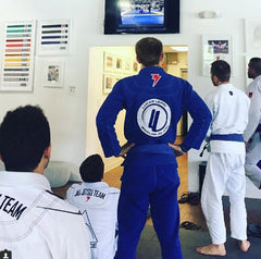 Lucas Lepri Team Watching their BJJ Professor on T.V