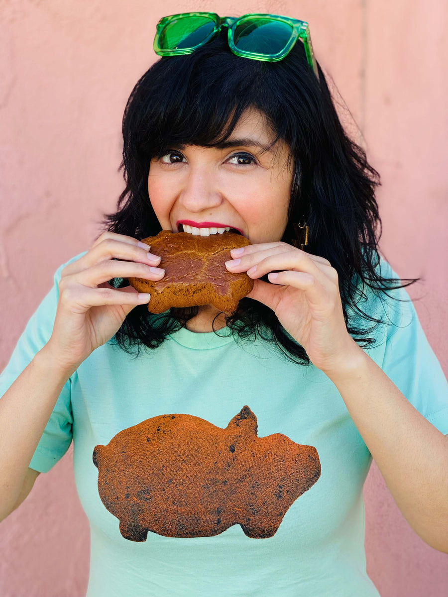 BarbacoApparel's Marranito Pan Dulce Graphic Tee on Female Model (front view)