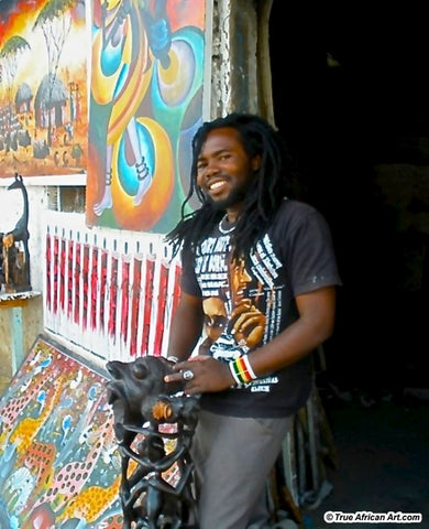 Ras T outside his studio in Tanzania