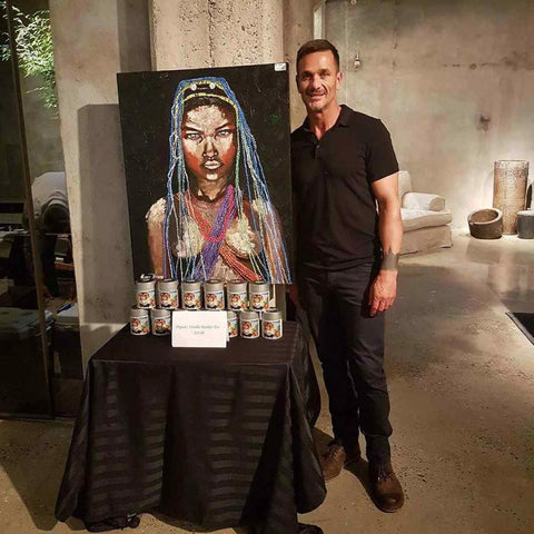 Kowie Theron with one of his sold artworks.