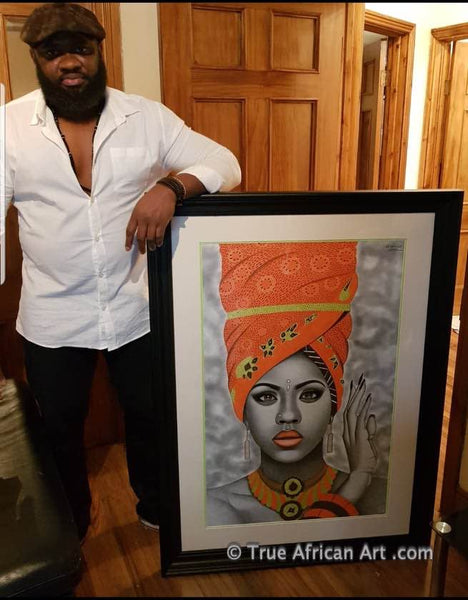Michael Oguguo with the finsihed painting.